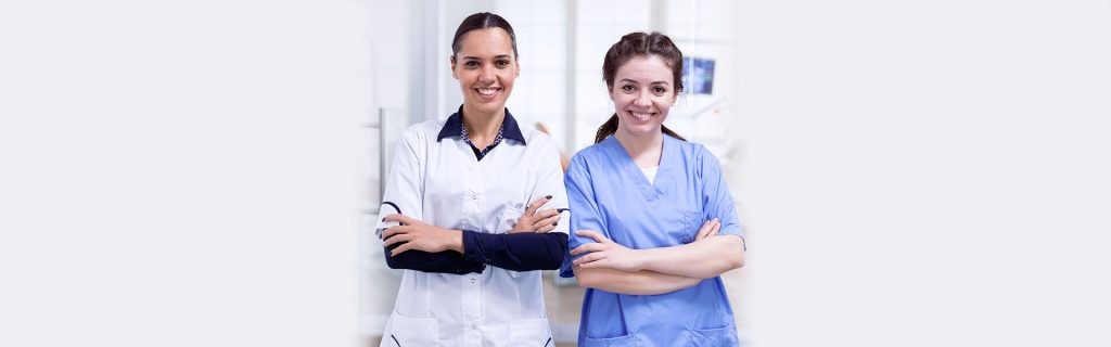 Happy Patients with dentist after root canal treatment at Brantford