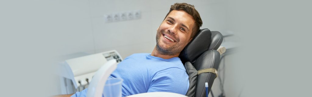 Happy boy after finishing him Root canal treatment with Brantford dental clinic