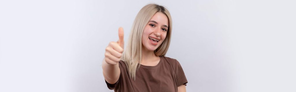 Happy girl after safe braces treatment at Brantford