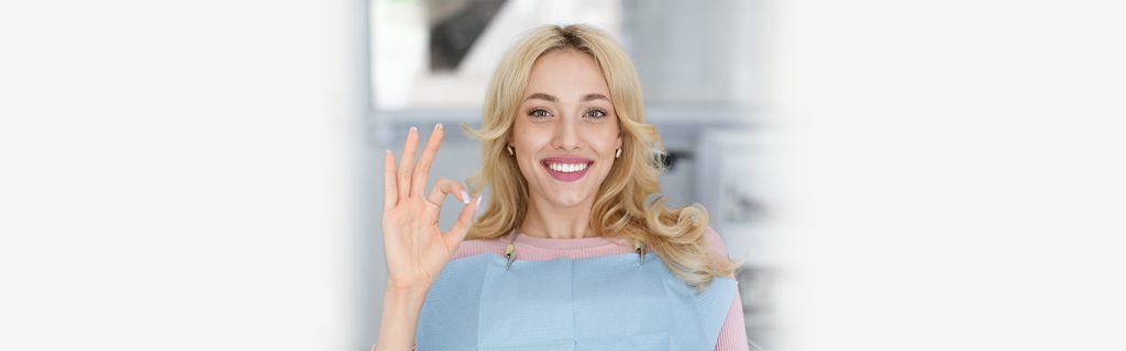 Girl with happy pose after the dental treatment at Brantford