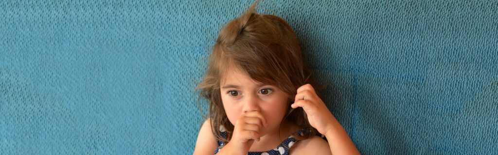 child seeking her thumb